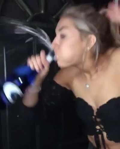 Chugging champagne