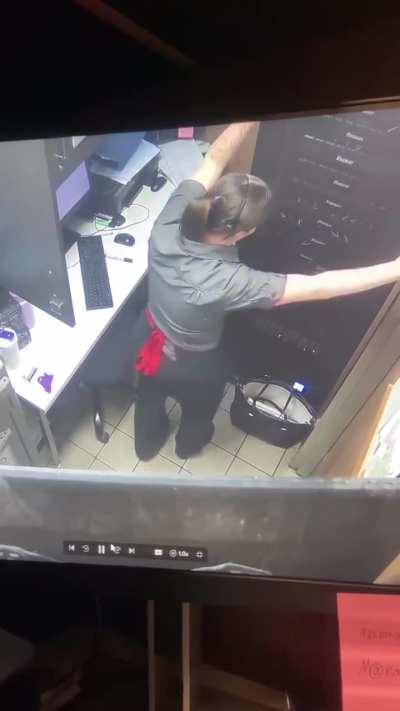 Cashier worker drops the money on the floor