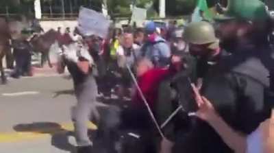 LA Cops on horses confront old Native American man and shoot into crowd