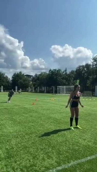 Kick a bottle off her head