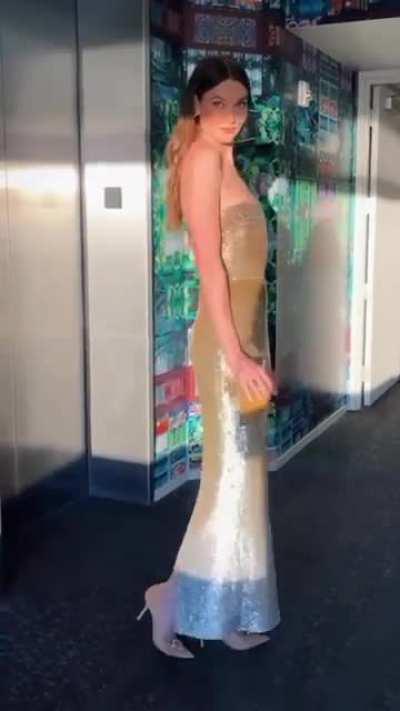 Klossy in a golden dress