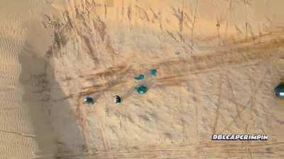 Cybertruck jumps a sand dune: tire liner, sound dampening, airbox, hood, windshield, front bumper, radiator all gone