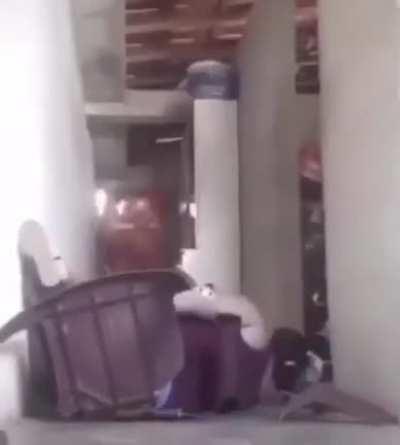 Trying to sit on a plastic chair with legs crossed...