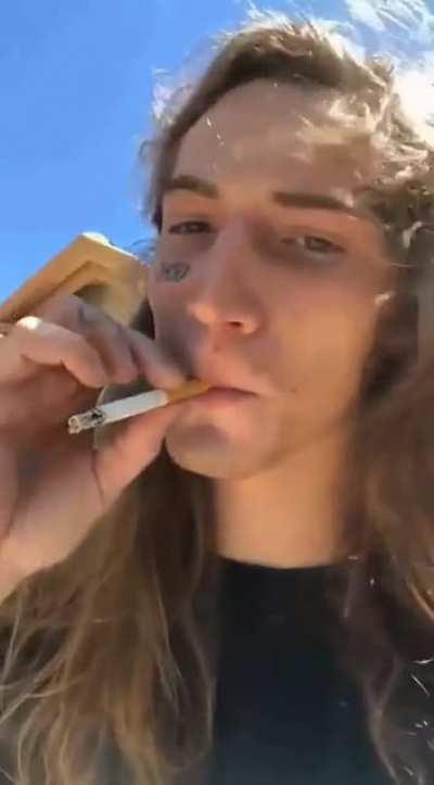 To smoke a cigarette