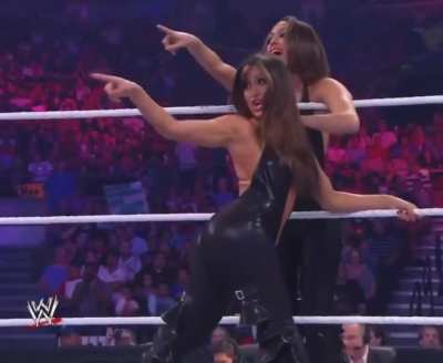 Nikki Bella in black latex spanking her booty