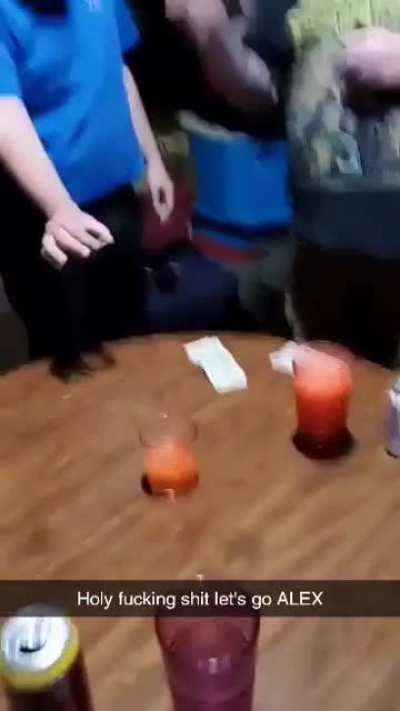 Just guys being dudes dunking quarters