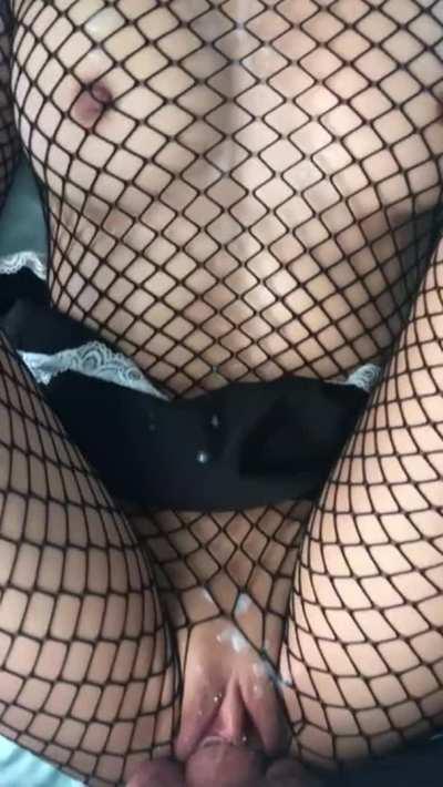 Teen in fishnets gets covered in cum