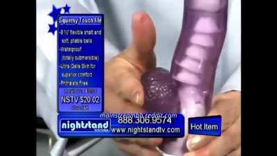 Unknown Infomercial Host Squeezes the Balls of a Dildo (2011)