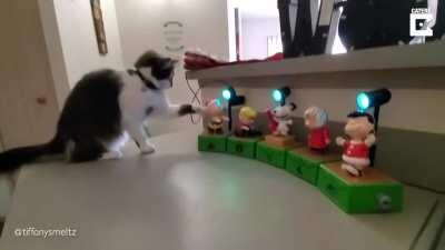 Startled by musical Christmas decoration.