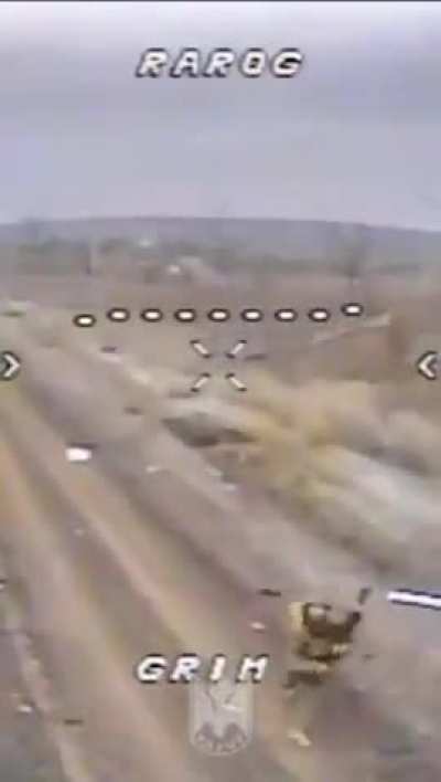 Russian soldier swings his rifle at an Ukrainian FPV kamikaze drone. Location unknown, January 2025