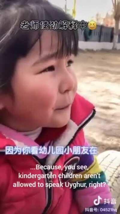 Young Uyghur girl ashamed to speak her name in her native language