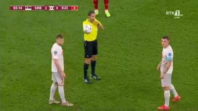 Xhaka insulting the Serbian players and then holding his balls against them. As a response the whole Serbian bench got riled up.