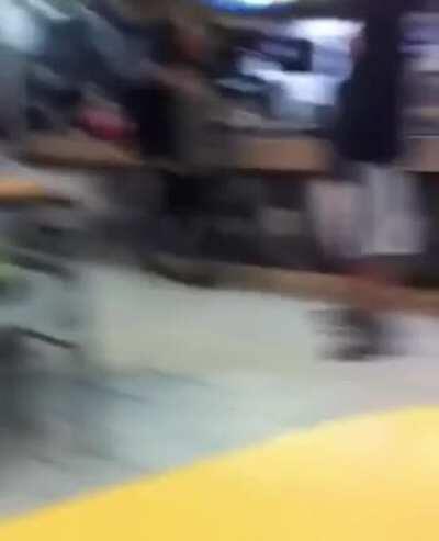 McDonalds cashier in Greenwich hits two customers with a stick after they slap him and jump the counter