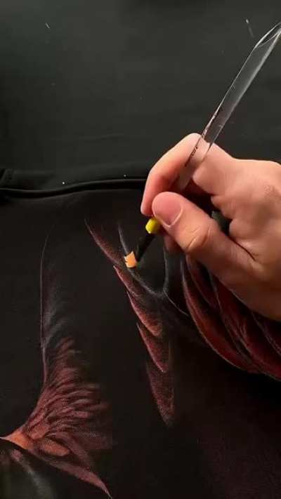 a bleach artist named nik vikond turned this black hoodie into a piece of art 🤯