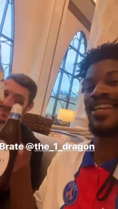 Jimmy and Dragic share a beer after today's victory