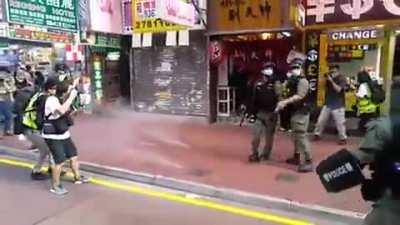 Trigger-happy cop shoots pepper balls at press and civilians