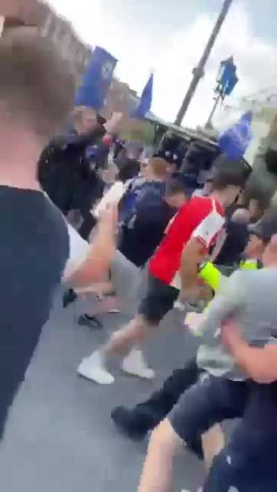 Chelsea fans taunting an Arsenal fan