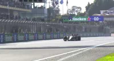 George Russell finishes what??