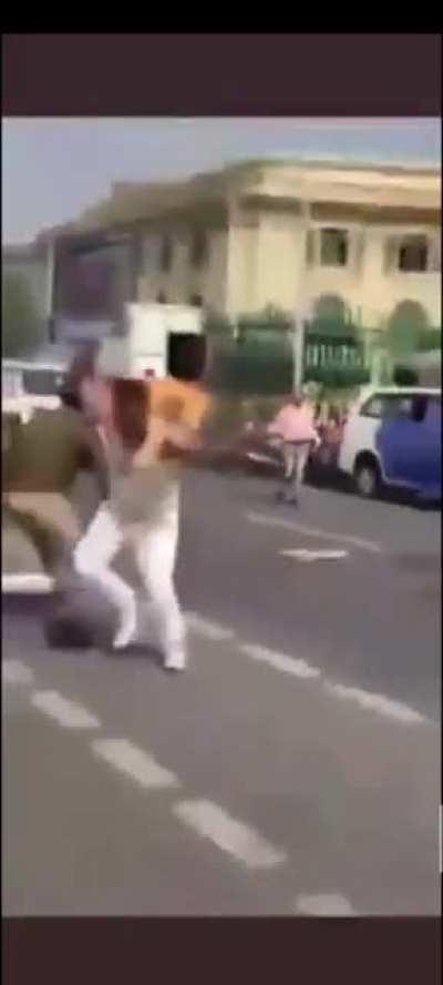 A Party worker tries to irk opposition fans by setting their leader's poster on fire in front of them but instead he sets himself on fire.