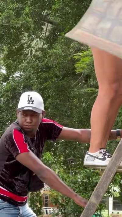 Beautiful Blonde Climbs Stairs in a skirt and teases men