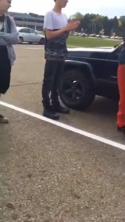 Racist bully gets kicked in the face through glass window