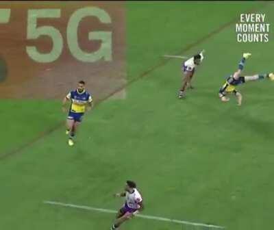 Justin Olam clotheslines Mitch Moses