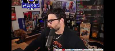 Hasan reaches over and suddenly Kaya, his dog, repositions in her bed after he looks to his second monitor. (clip of before the incident)