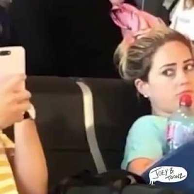 Guy gets roasted for taking selfies at airport.