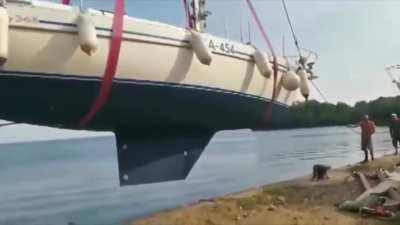 ...when you buy a sail boat and save on a crane