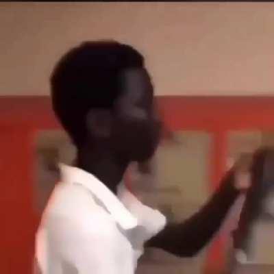 Kid uses belt in a fight