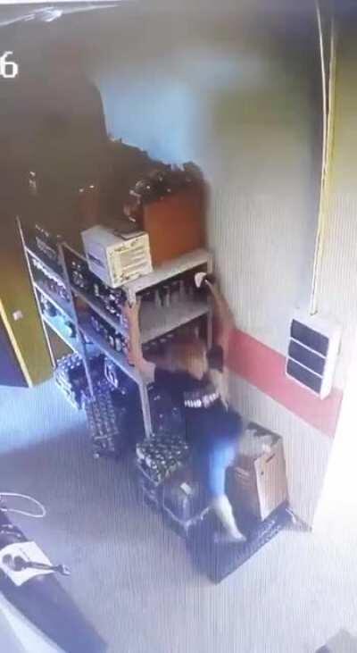Woman Climbs Onto Unstable Shelf Instead Of Using A Ladder