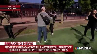 Journalist Clipped by gas grenade while on air.