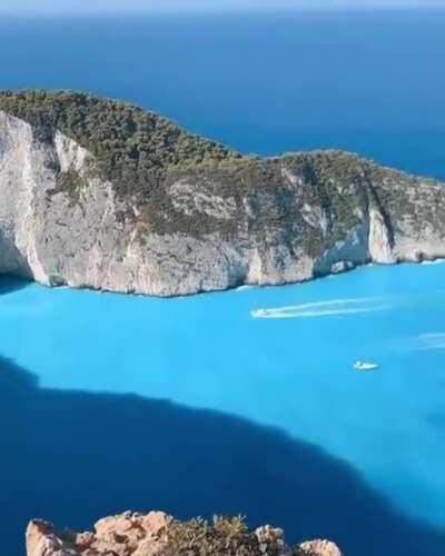 🔥 A beautiful shade of blue at Navagio Beach in Greece