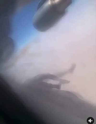 [NSFL] USAF C-17 flies away from Kabul while the lifeless remains of an Afghani flap in the turbulence