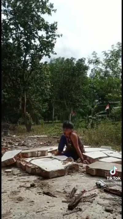 Kid gets folded by a concrete wall