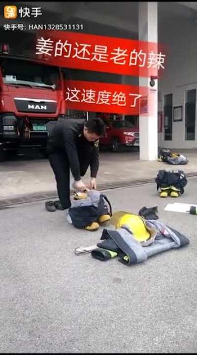 This firefighter showing how quick he can put on his fire gear.