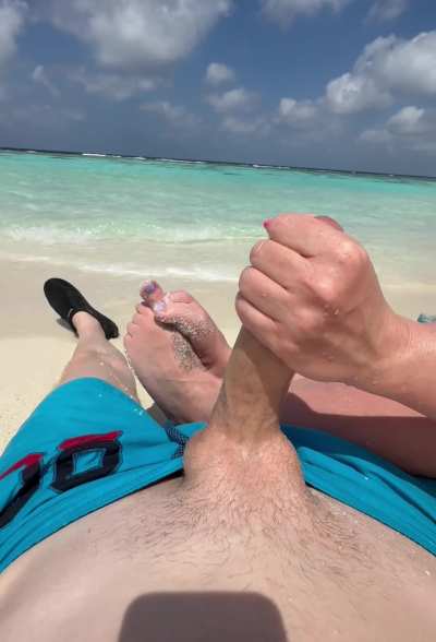Even on the public beach I can't keep my fingers off his cock!