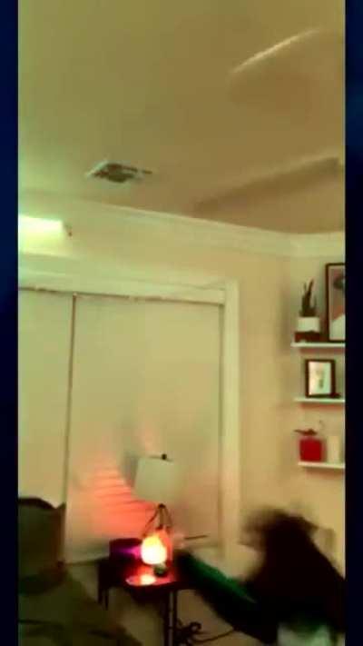 Standing on your bed with your fan spinning