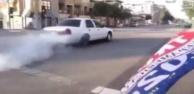 Los Angeles: Instant Karma for the antifa/blm supporter smoking his tires at Trump supporters!