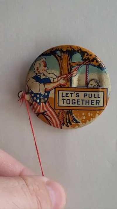 1943 Anti-Hitler button by the Evans Novelty Company from Chicago, Illinois