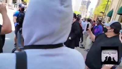 Handicapped protester worms her way out of her wheelchair so they can claim the cop threw her on the ground.