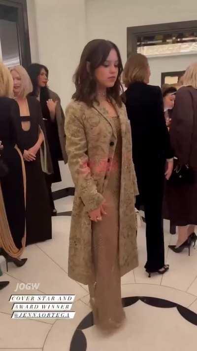 That coat needs to come off to reveal that sexy see thru dress