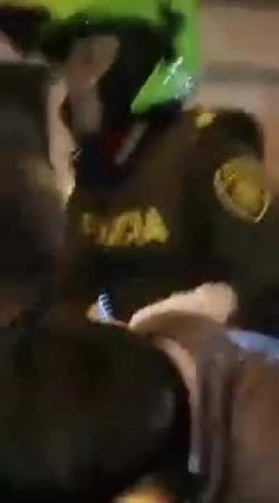 Police force taking a human rights defender after beating him in Siloé, Cali.