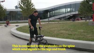 Paralyzed man walks again after a team of Swiss doctors implant electrodes in his spine to reactivate his muscles
