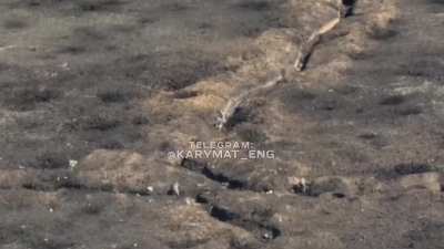 Close combat in the trenches between Russian and Ukrainian soldiers. One Russian gets shot in the head [April 2023]