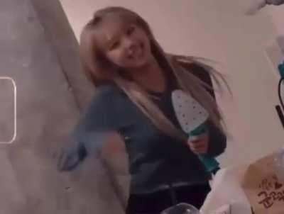 Chaeyoung vibing with a steam iron