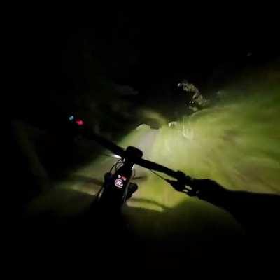 Downhill POV on a pitch-black mountain