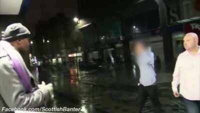 Couple of Scottish racists start a fight with a busker and get put on their arses.