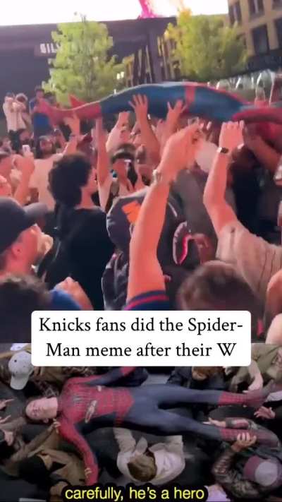 New Yorkers celebrating NBA win over Boston and recreating spider man meme.