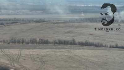 Ukrainian armour advances under fire. Polohy, Zaporizha region, 2023-03-18.